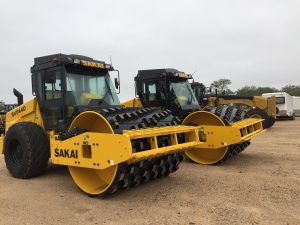 Sakai SV544DCF enclosed cab soil rollers with smooth drums and padfoot or sheeps foot shell kits installed.