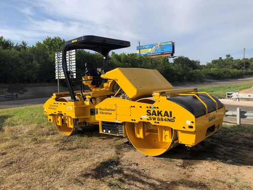 Sakai SW884ND oscillatory and vibratory double drum 79" 14 ton asphalt roller.