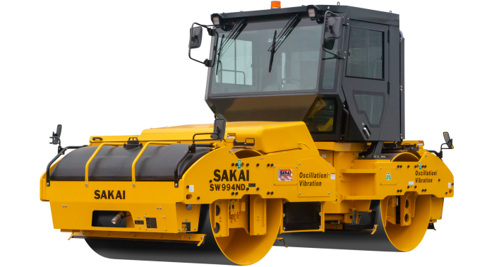 Sakai SW994ND highway class 84" vibratory and oscillatory tandem asphalt roller with enclosed cab and mirror kit.