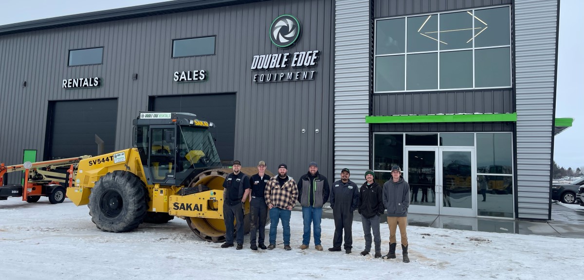 New Sakai dealer employees stand in front of Double Edge Equipment in Idaho Falls.