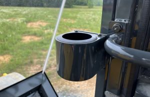 Secondary cupholder inside the SV544 or SV414 soil compactor enclosed cab.