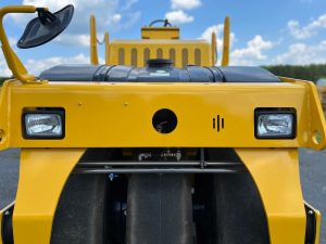 Standard front halogen lights on the SAKAI GW754 vibratory pneumatic tire roller or traffic roller.
