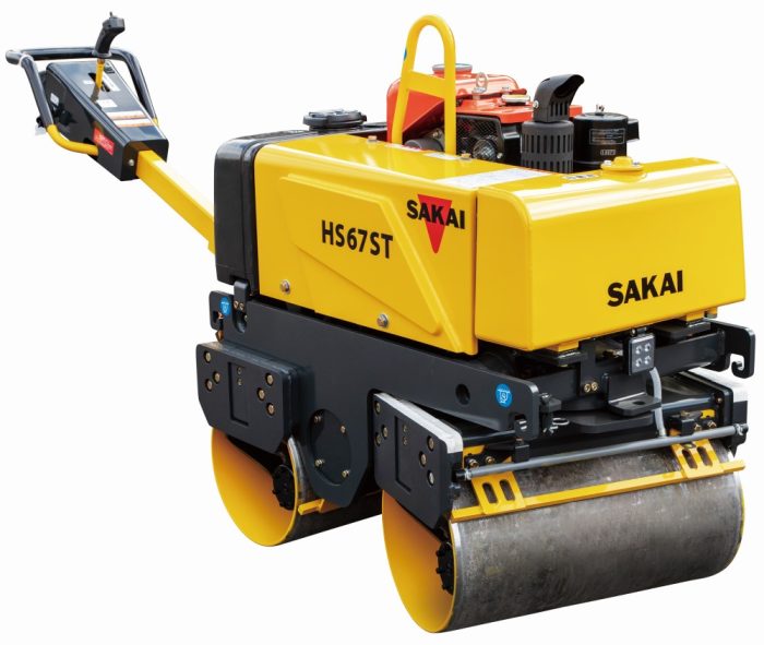 Sakai HS67ST steerable walk behind vibratory tandem asphalt roller with front drum turned.