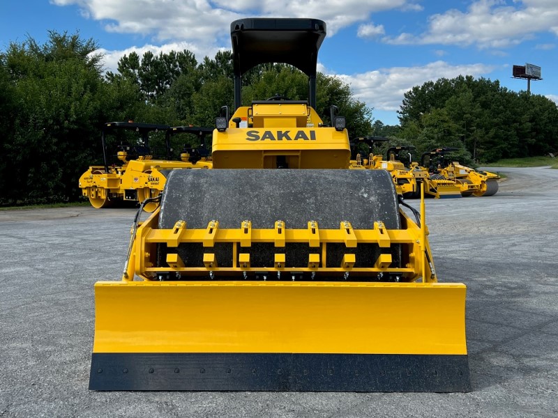 Front view of Sakai SV414 soil roller with strike off blade kit and smooth shell kit.