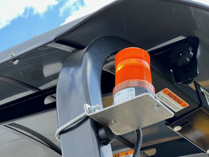 Rear view of the accessory ROPS mounted beacon or LED strobe and bracket available for the 47" to 54" small asphalt roller line.