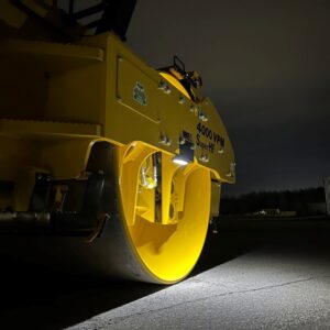 View of the underside of the optional frame mounted LED drum light or asphalt mat light kit for SAKAI rollers.
