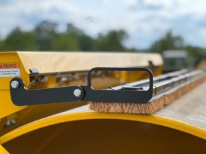 Close up of the optional coco mat kit for the highway class Sakai asphalt roller lineup.