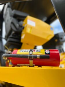 Another angle of the Badger ABC fire extinguisher and Sakai mounting kit option for 79" and 84" asphalt rollers.