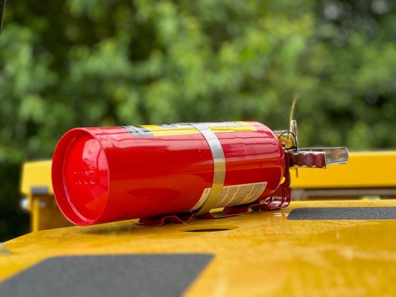 Accessory fire extinguisher kit for Sakai highway class asphalt rollers.