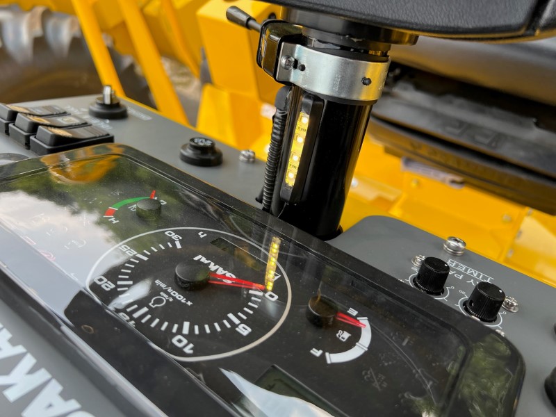 How the LED dash control panel illumination light strip is mounted to the steering column of the SW774 asphalt roller.