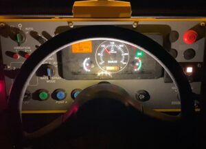 Illuminated dash panel or gauge cluster on the SW884 and SW994 highway class double drum asphalt rollers.
