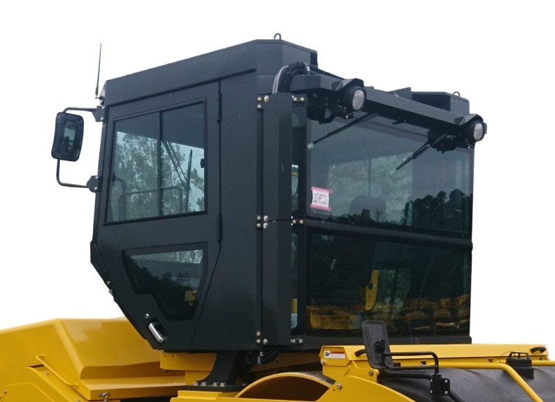 SW994 asphalt roller shown with optional air conditioned operator cab, factory installed.