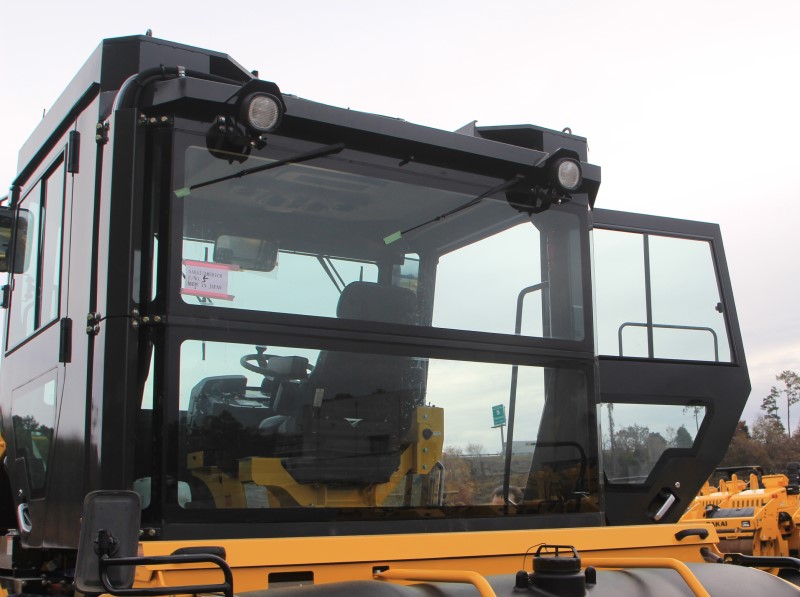 Rear view of the optional air conditioned operator cab on a SW994 asphalt roller.