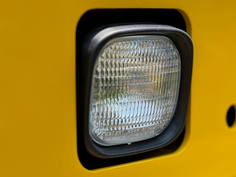 Close up of the halogen light assembly on the rear of the 67" SW774 asphalt compactor.