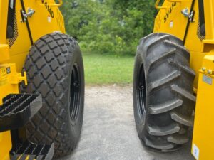 Side by side comparison of a turf tire vs the optional lug tire on an SV414 soil compactor.