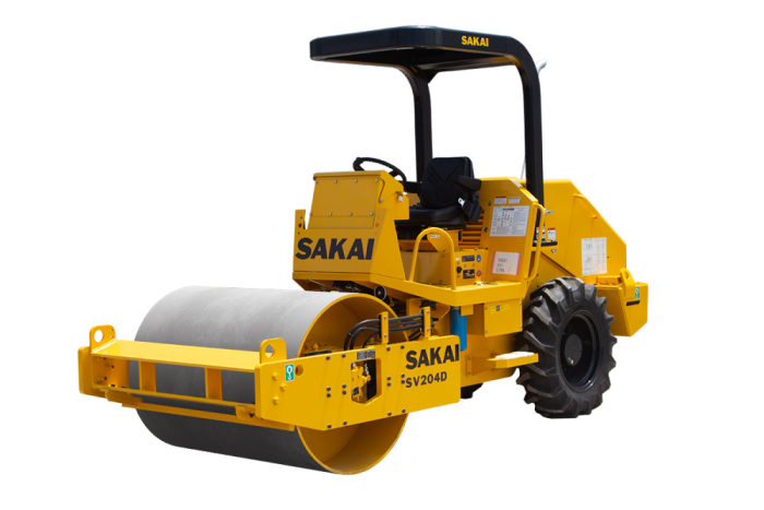 Sakai SV204D vibratory 54 inch single drum 5 ton soil compactor with traction control, lug tires, and a Kubota diesel engine.